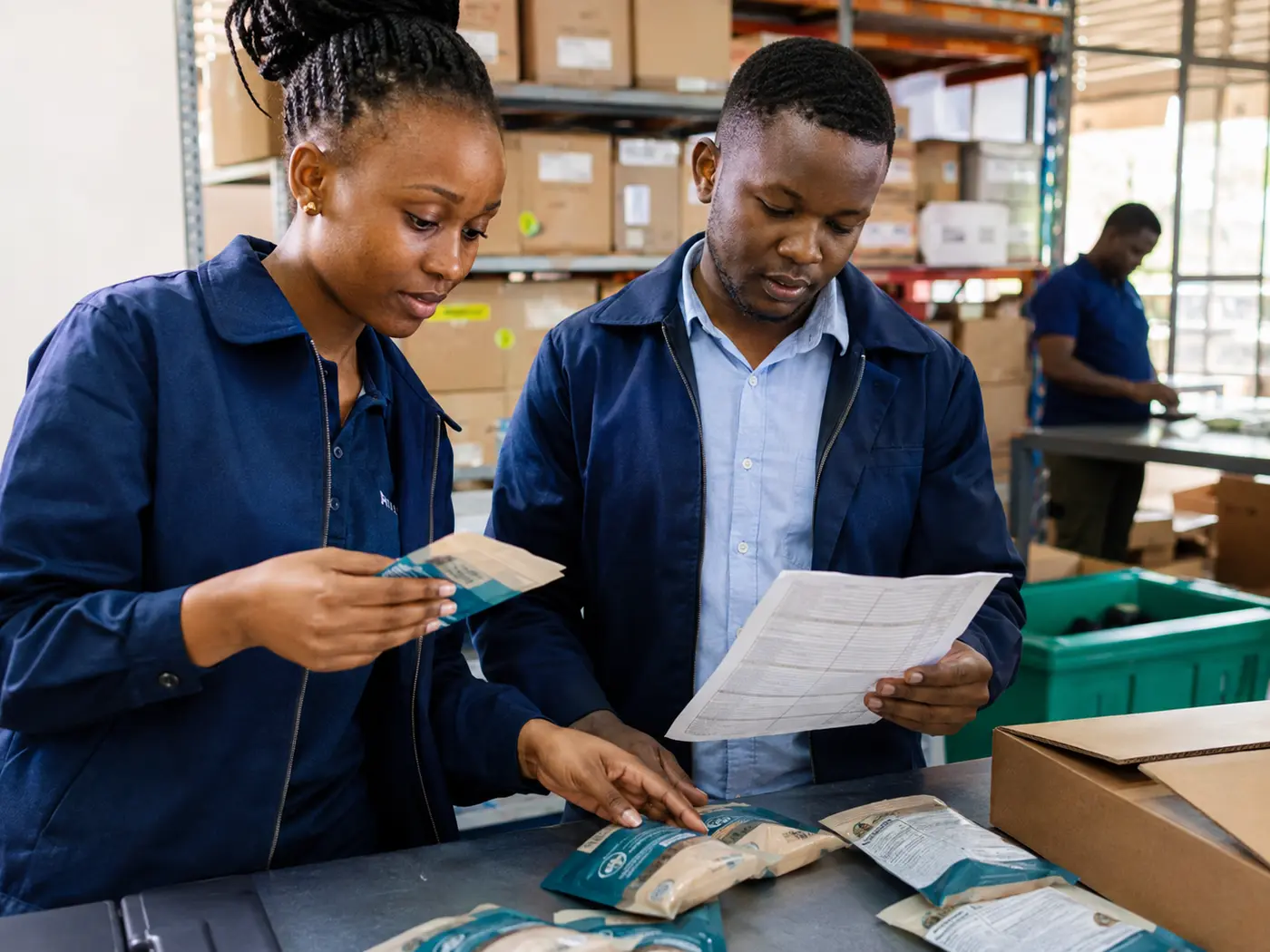 INUABIZZ field professionals reviewing product samples and quality records